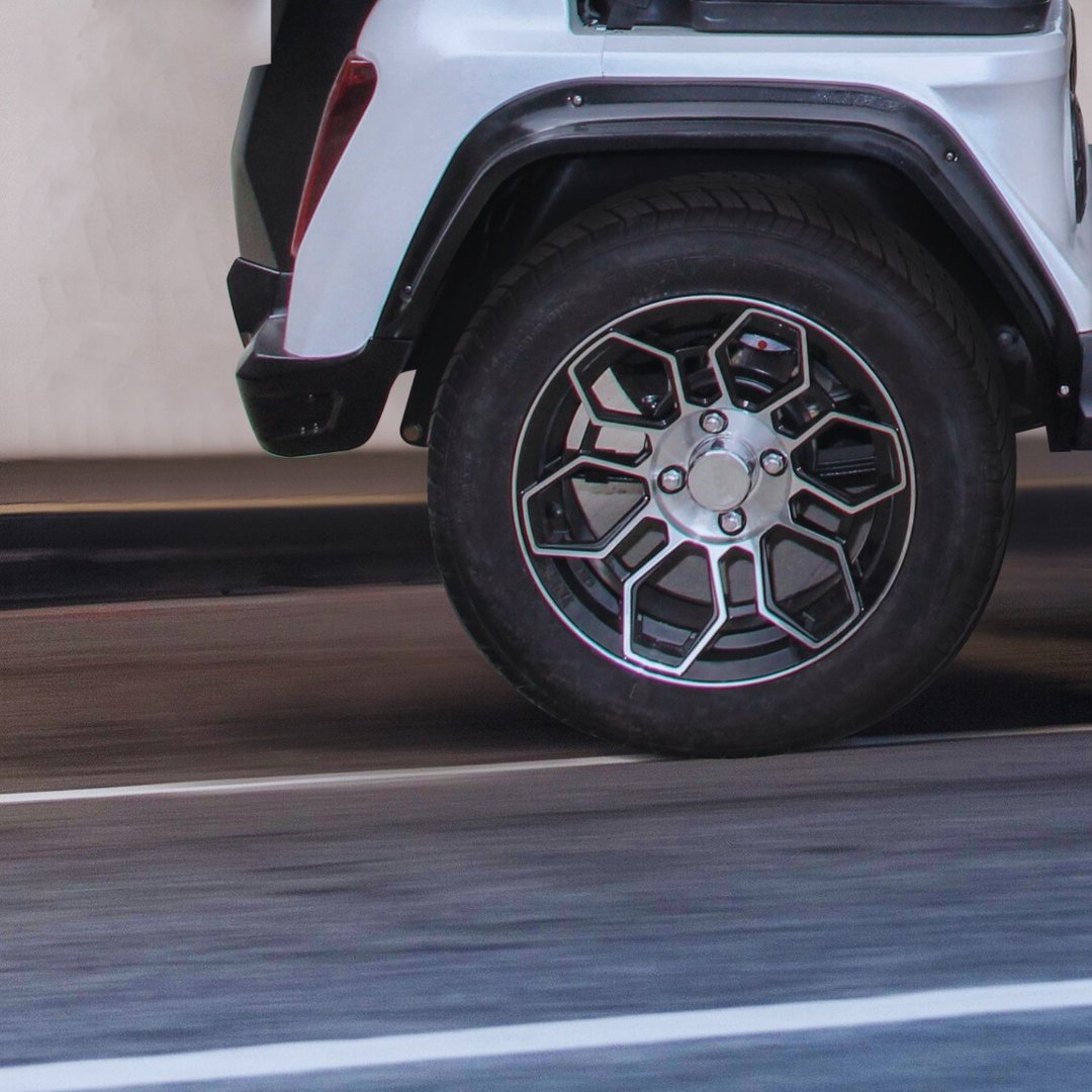 HDK Classic 2 White lifestyle image showcasing the premium 12-inch wheels