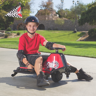 Razor - Crazy Cart lifestyle pose with child on cart